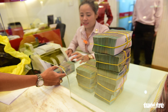 Các ngân hàng cho rằng cần mở rộng đối tượng hỗ trợ 2% lãi suất như hỗ trợ lãi suất vay bằng đồng ngoại tệ cho doanh nghiệp xuất khẩu, thay vì chỉ bằng đồng Việt Nam - Ảnh: QUANG ĐỊNH