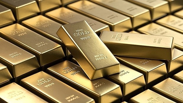  Giá vàng có thể chạm mốc 4.000 USD/ounce vào năm sau. Ảnh: Reuters.